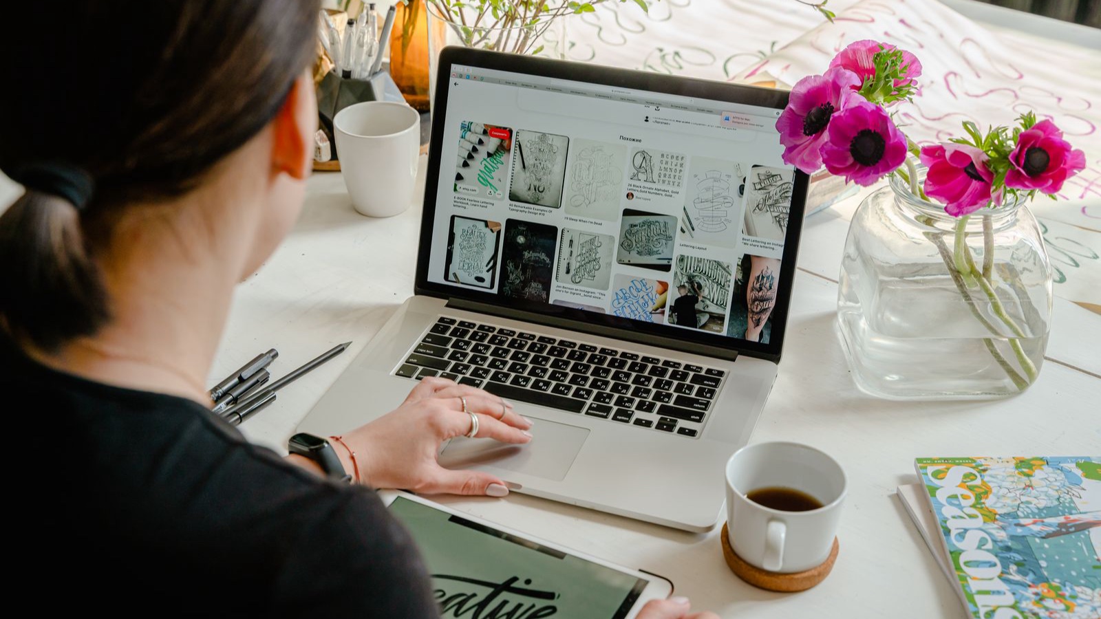 B2B brand design: Making technical expertise visible A person working on a design layout on a laptop screen