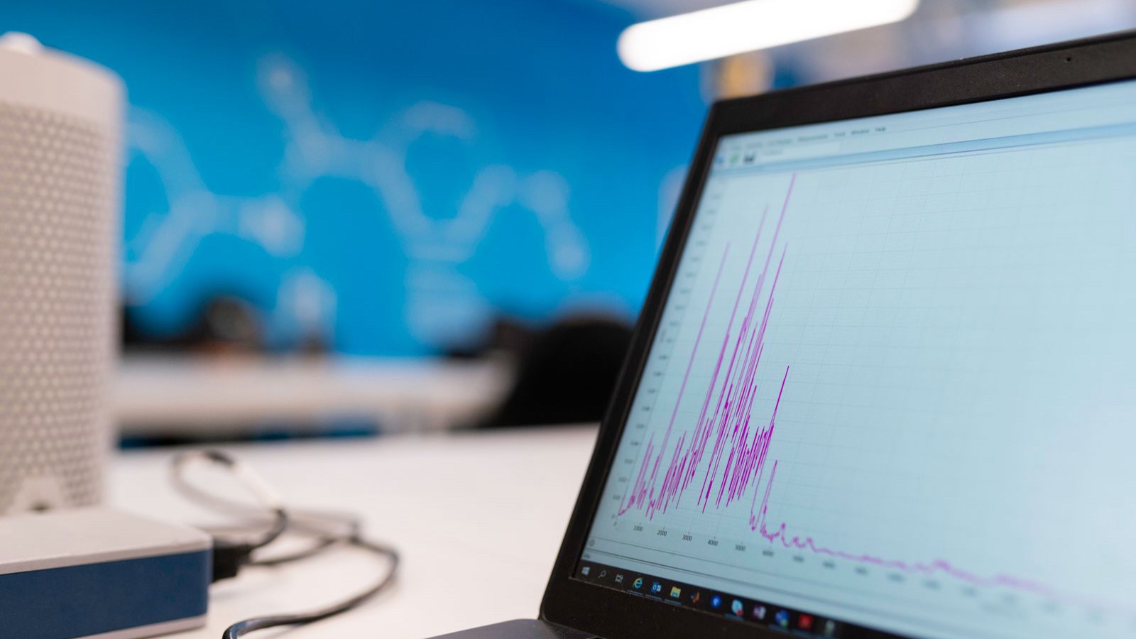 Social Media Reporting: Turn Metrics into Useful Decisions A data analysis graph on a laptop screen