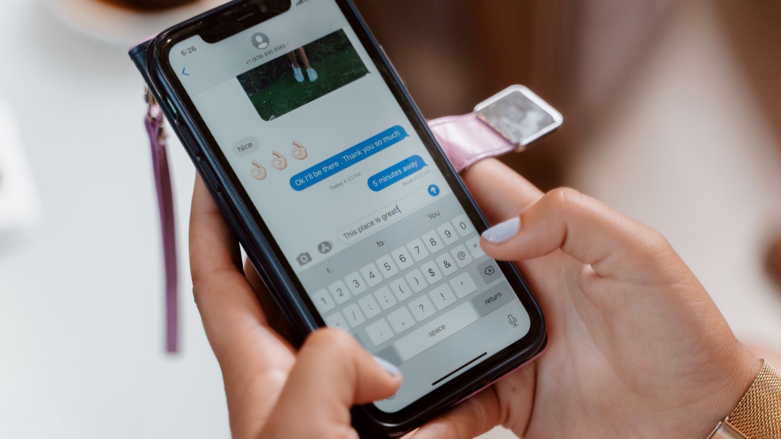 Community Management: Respond Quickly Without Losing Accuracy Hands typing a message on a smartphone