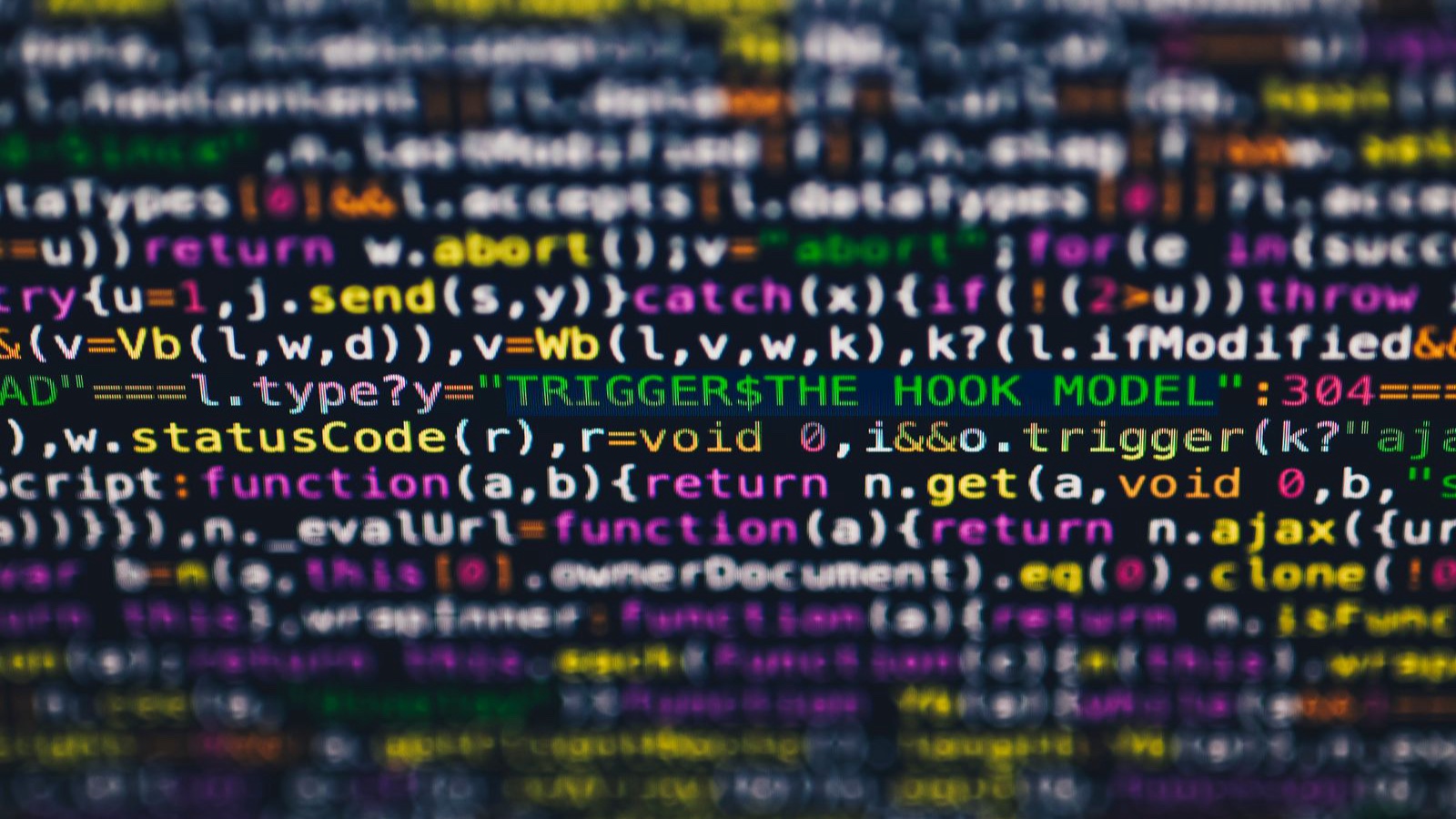 Software observability: from an error message to an explanation Colourful source code lines on a computer screen